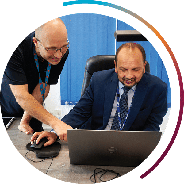 L.E.A.D. IT Services engineer works with customer laptop