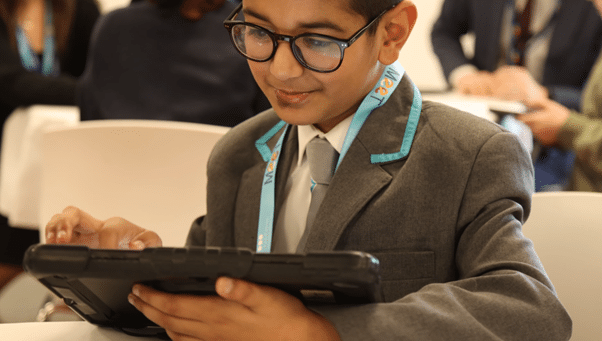 Student at MEET with ipad