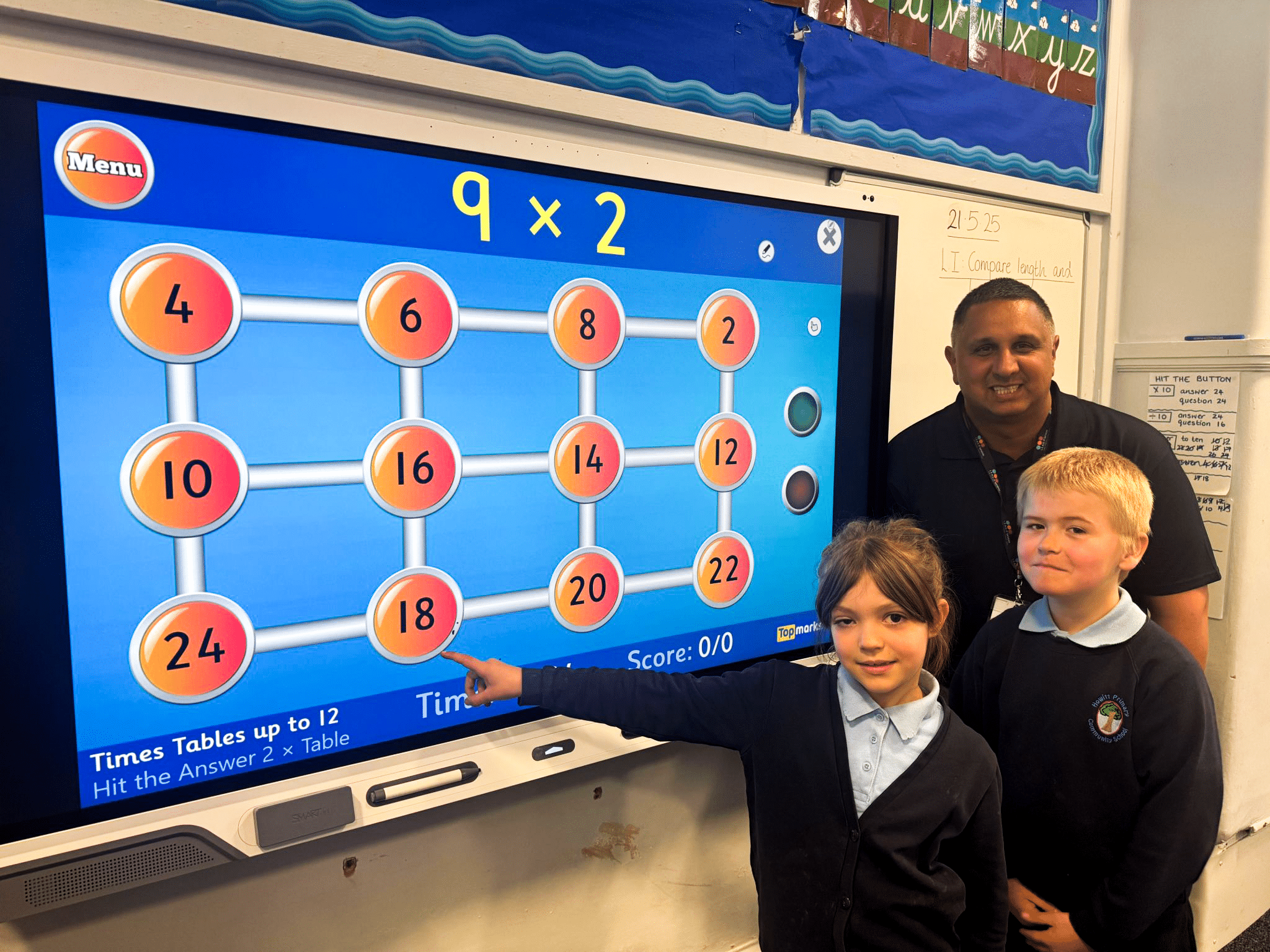 Sukhraj and kids with whiteboard (edit)