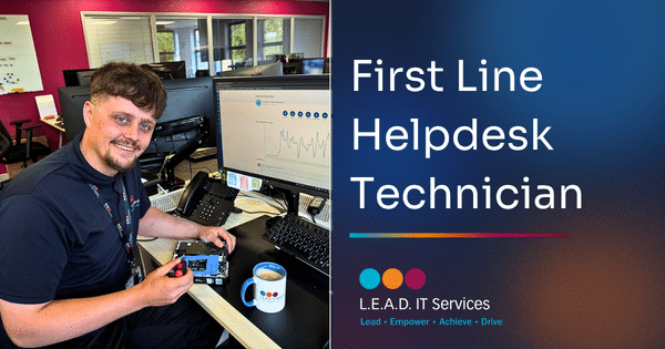 first line helpdesk technician at lead it services graphic next to a male lead it technician smiling and holding an open pc